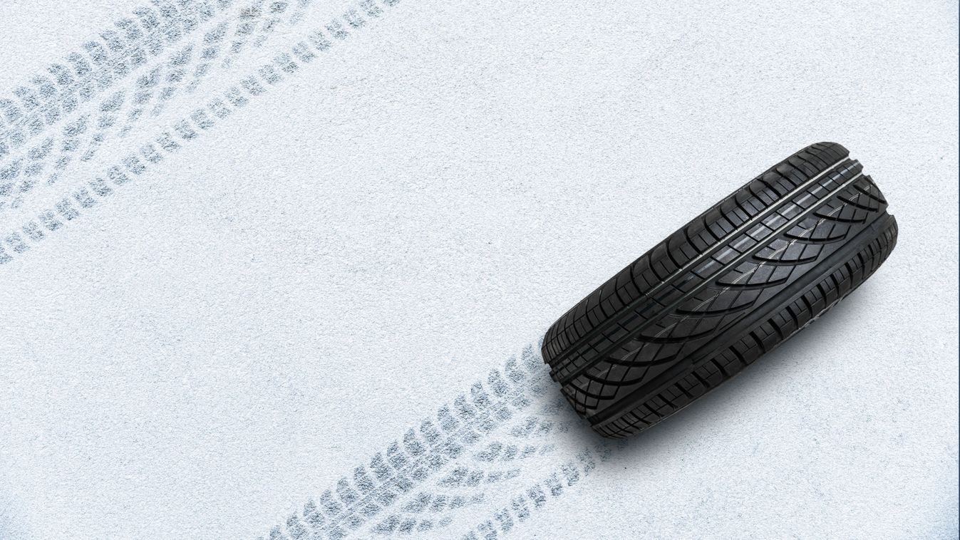 Car,Tire,On,Winter,Road,Covered,With,Snow